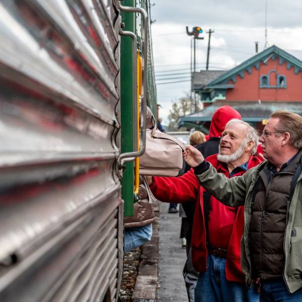 a man standing in front of a building