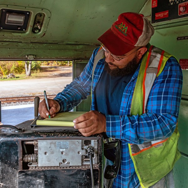 a person standing in front of a stove